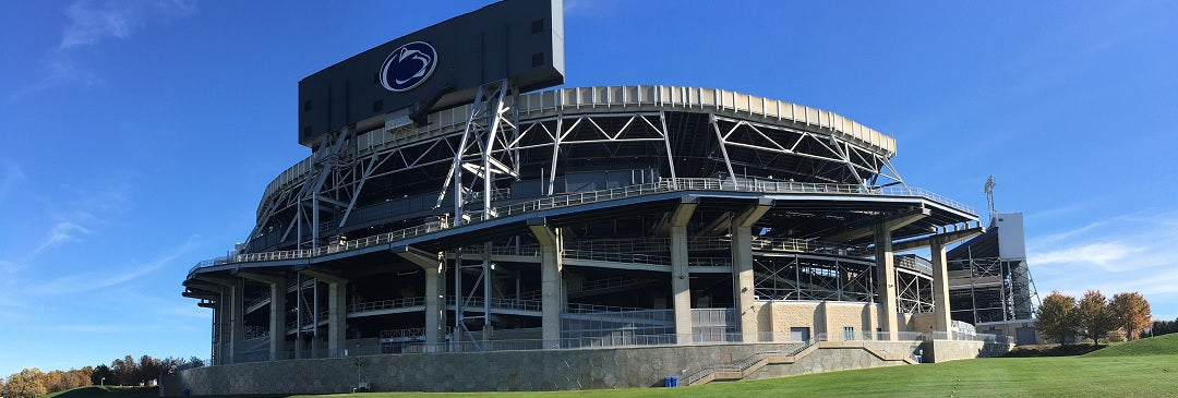 Game Ball and Helmet Stickers: The Never-Say-Die Nittany Lions